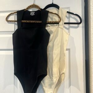 Cream and black colored OQQ tops for sale